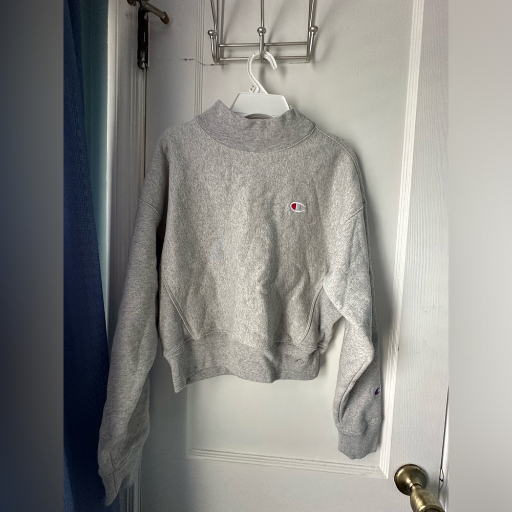 Women champions turtle neck sweater.